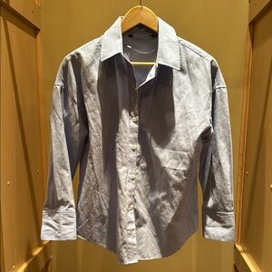 Woman’s blue Shirt